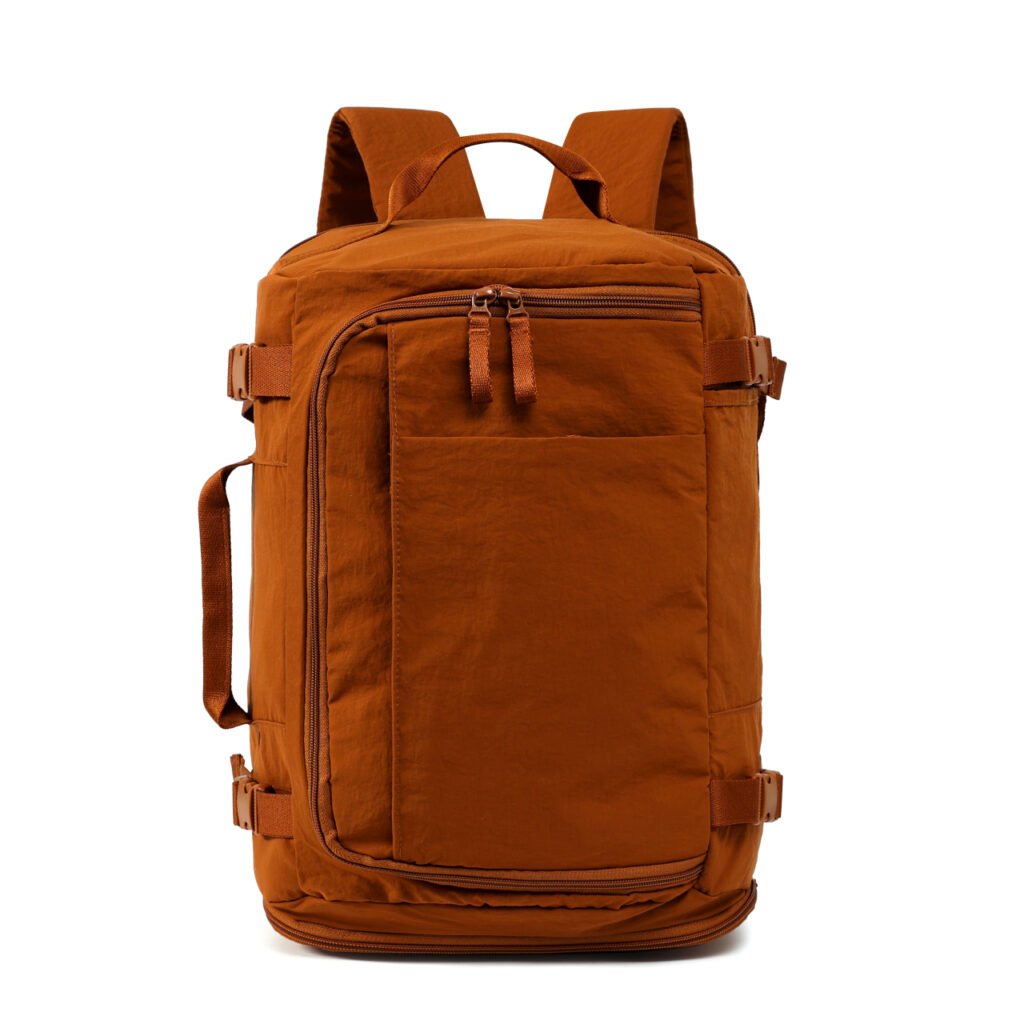Orange travel backpack with side handle and compression straps