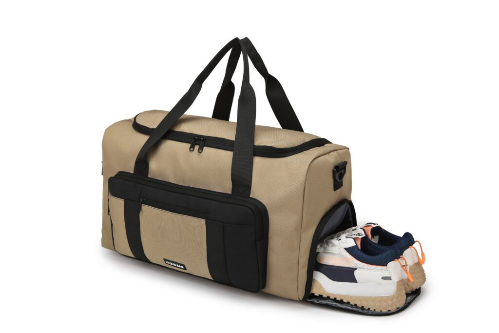 Khaki travel duffel bag with an open shoe compartment