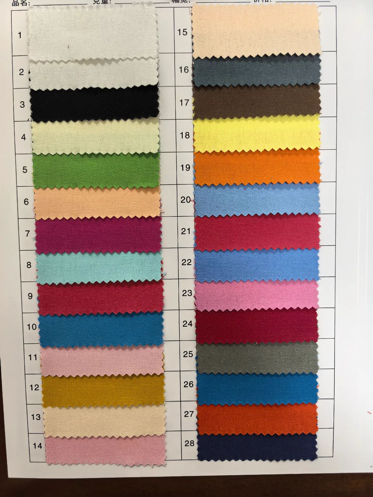 Canvas fabric color swatch card with samples numbered 1 to 28