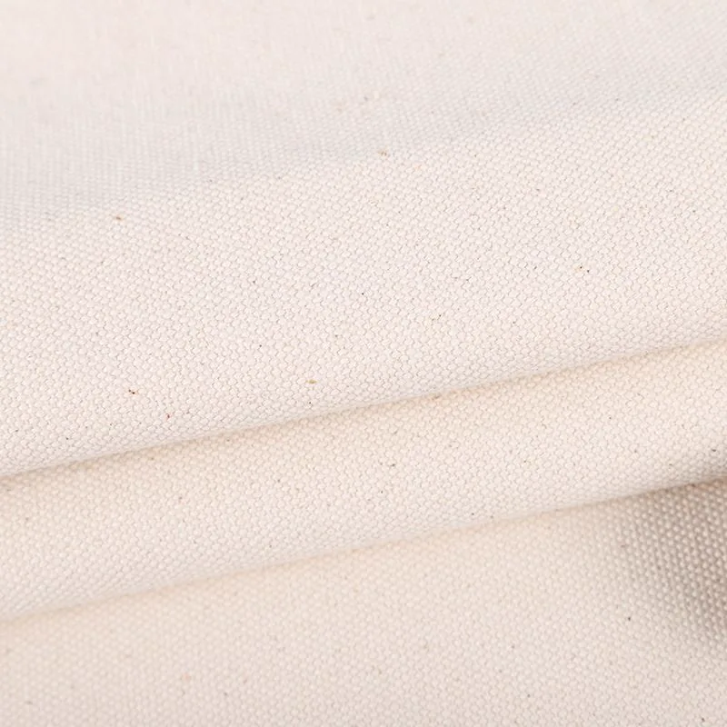 Folded natural canvas fabric showing its woven texture