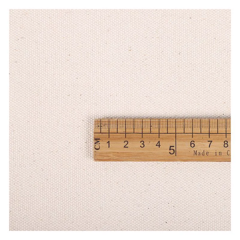 Natural canvas weave shown beside a scale reference