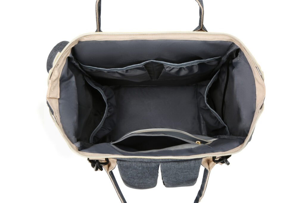 Open backpack interior with divided pockets and organized compartments