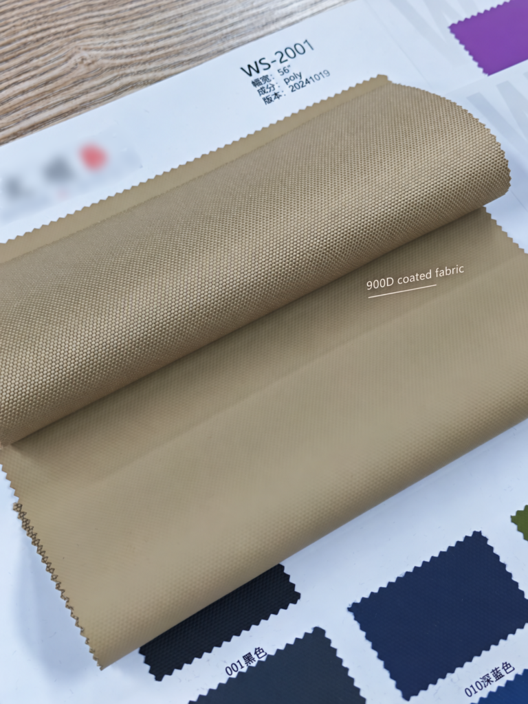 Tan fabric sample folded back to show its face and reverse surface