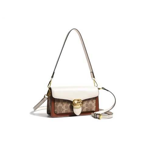 Side view of a patterned flap shoulder bag